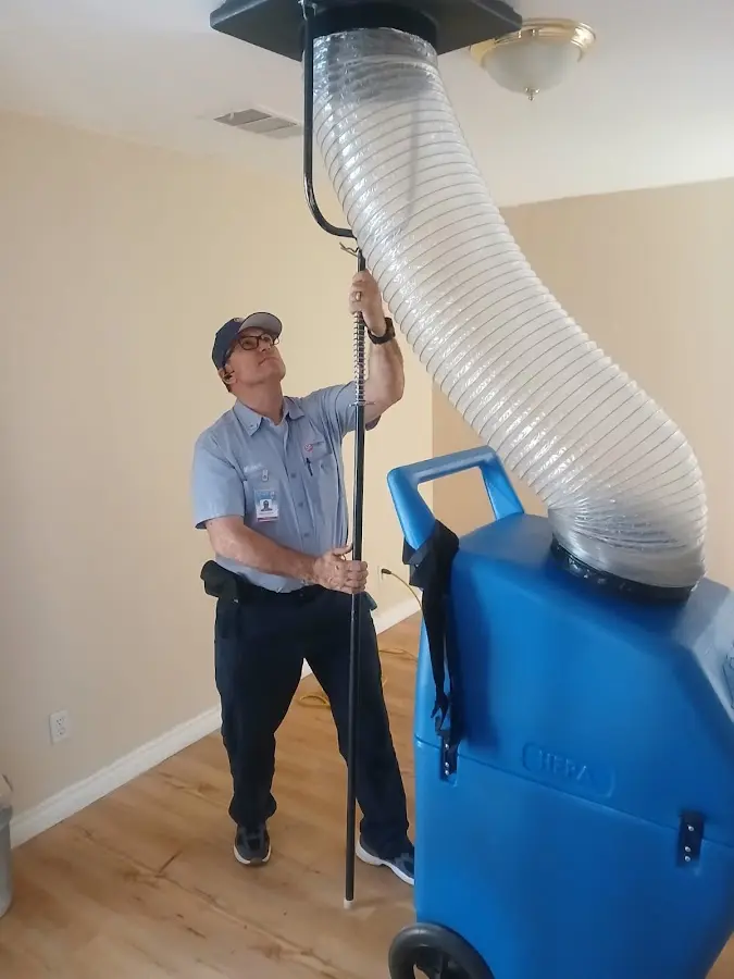 Furnace Tune-Up technician using HEPA equipment in Vacaville